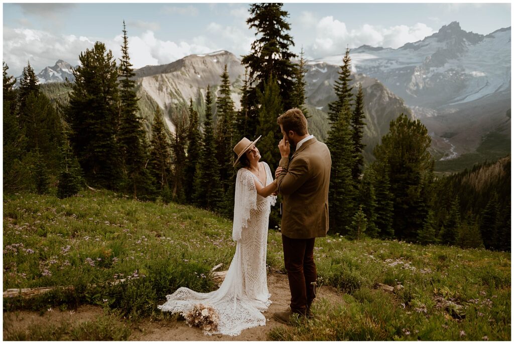 Groom cry while listening to Bride's vows during intimate elopement in Mount Rainier National Park
